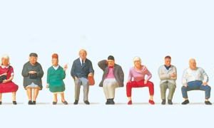 Sitzende Reisende. 14 Figuren