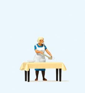 Hausfrau am Tisch, Essen schö