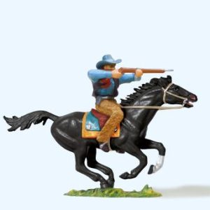 Cowboy reitend, mit Gewehr